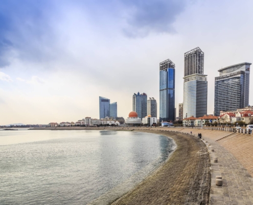 A beautiful villa community in Emirates City, Ajman, representing the family-friendly property options available for sale.